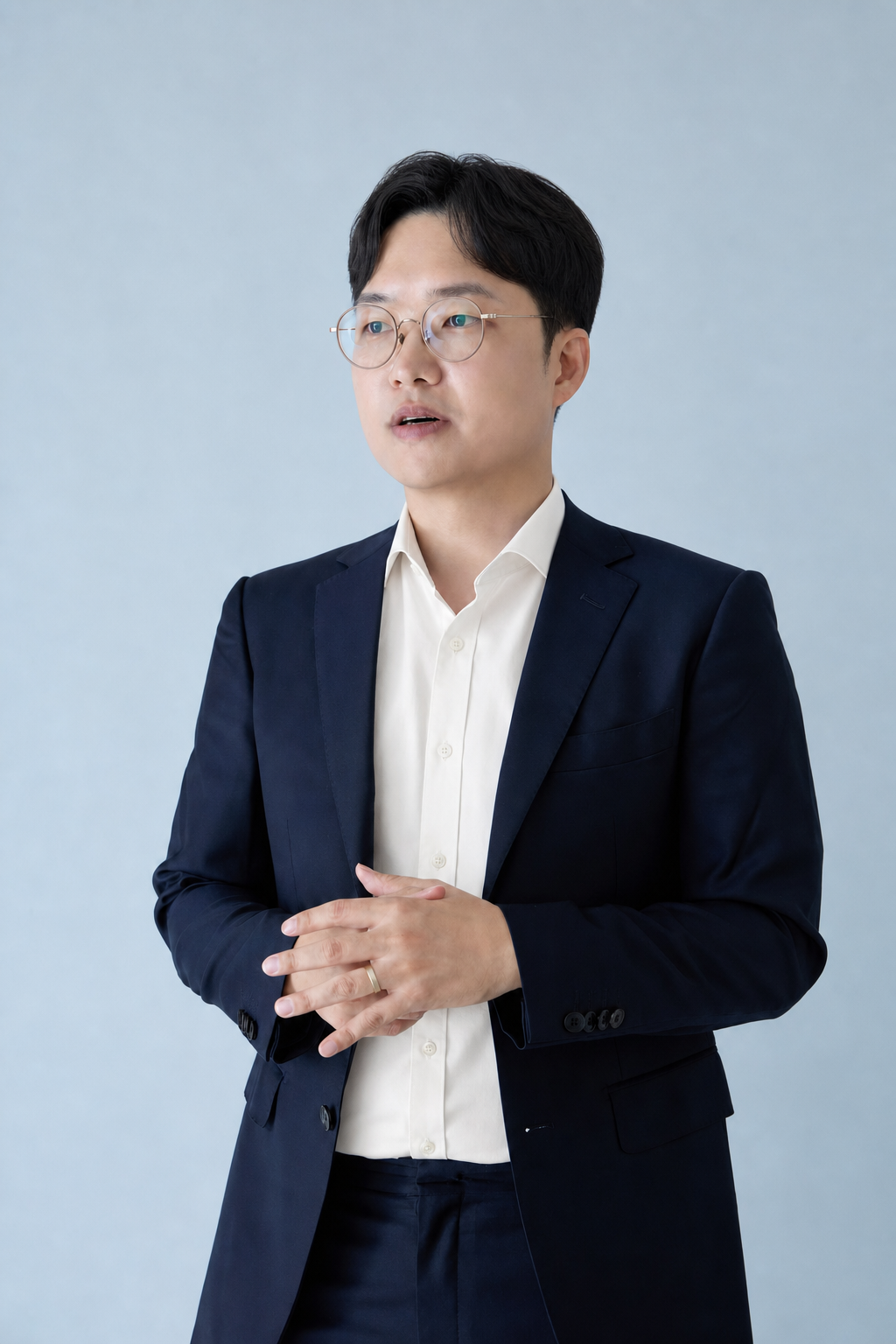 Mark Kim, founder of Lectiv AI, wearing a suit
